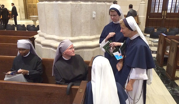 Women religious take their places for the prayer service at St. Patrick's Cathedral in New York City.