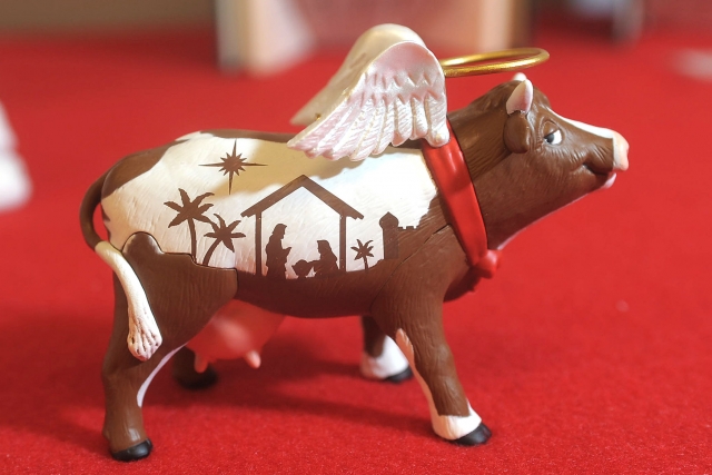 A nativity Scene painted on a Cow ornament.
(Patrick McPartland/Staff Photographer)