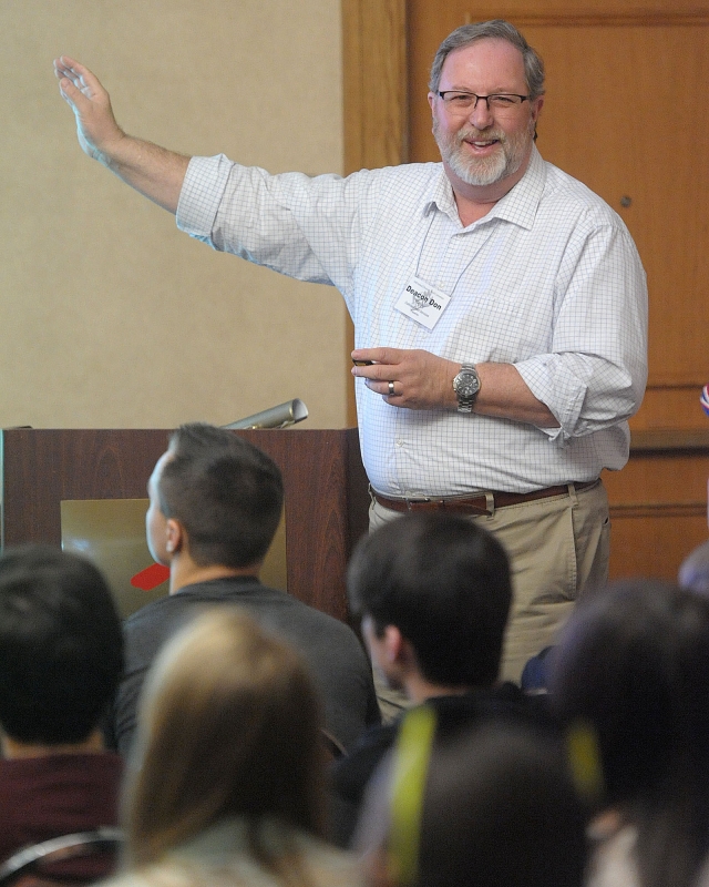 Deacon Don Weigel gives a talk about his experiences working with Catholic Relief Services  Mercy in the World during a session at the 64th Annual Diocesan Youth Convention.