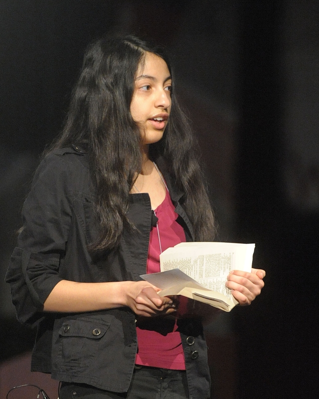 Chiara Raimondo reads from scripture as she gives witness at the 64th Annual Diocesan Youth Convention.