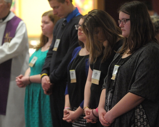 Young people pause for prayer at the 64th Annual Diocesan Youth Convention.