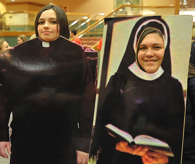 Josephine Conti and Kaitlin Burnett , St. Andrew Church, get their picture taken at the 64th Annual Diocesan Youth Convention.