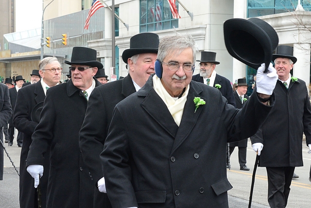 Father Richard Zajac marches with the members of the Blackthorn Club the 2015 St. Patrick's Day Parade.