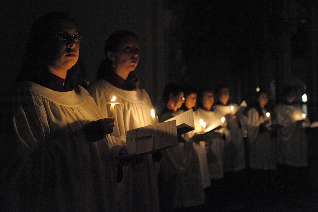 The Cathedral choir is illuminated by candle light at the start of the Easter Vigil at St. Joseph Cathedral, Buffalo, on Saturday night.
