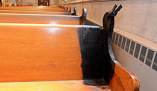 Pews were damaged by a fire inside St. Joseph Cathedral on Friday morning. (Photo by Patrick McPartland)