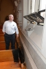 Michael Sullivan, director of diocesan buildings and properties, inspects the damage from a fire inside St. Joseph Cathedral on Friday morning. (Photo by Patrick McPartland)
