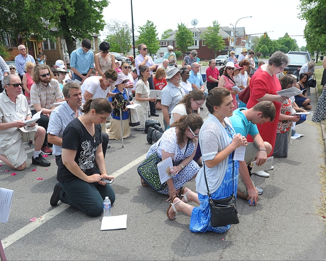 Corpus Christi procession from St. Stanislaus Church to Corpus Christi Church in Buffalo. The procession stopped at four altars along the way.