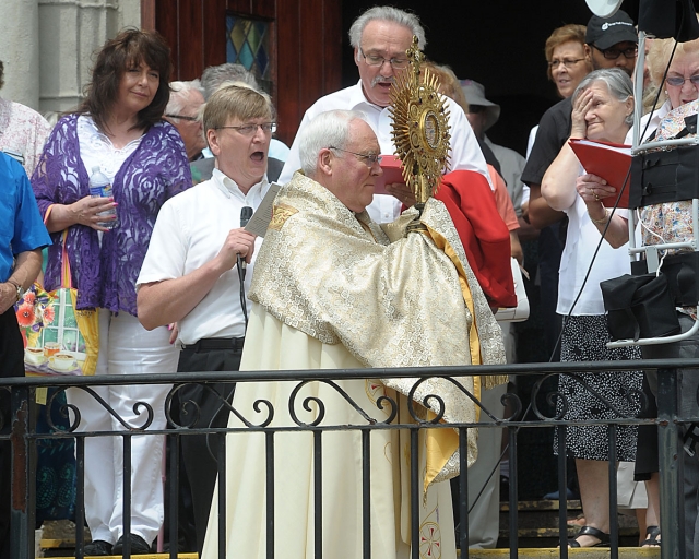 Corpus Christi procession from St. Stanislaus Church to Corpus Christi Church in Buffalo. The procession stopped at four altars along the way.