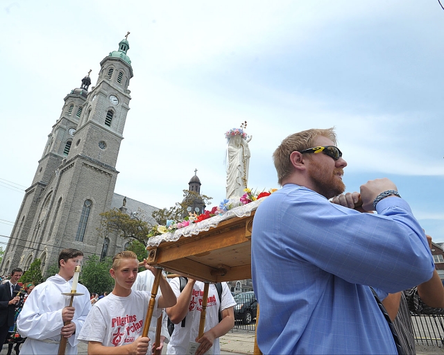 Corpus Christi procession from St. Stanislaus Church to Corpus Christi Church in Buffalo. The procession stopped at four altars along the way.