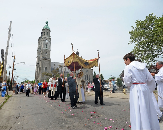 Corpus Christi procession from St. Stanislaus Church to Corpus Christi Church in Buffalo. The procession stopped at four altars along the way.