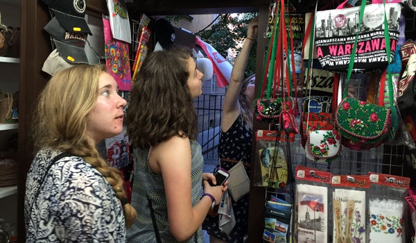 Debbie Urban (from left) and Brianna Williams go souvenir shopping in Warsaw. (Patrick J. Buechi/Staff)