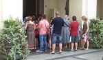 The Our Lady Chapel at Jasna Góra overflows with pilgrims during an English-language Mass. (Patrick J. Buechi/Staff)