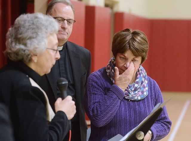 St. Peter School Kindergarten teacher Linda Calandrelli (right) wipes away tears as Superintendent of Catholic Schools Sister Carol Cimino (left), SSJ, announces that Caladelli has been awarded the Sister Lucille Socciarelli-Father John Sturm: Making a Difference Award.