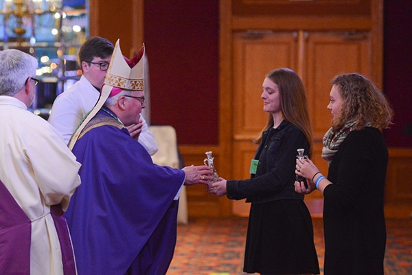 Bishop Richard J. Malone accepts the offertory during the closing liturgy of the 66th annual Diocesan Youth Convention. (Patrick McPartland/Managing Editor)