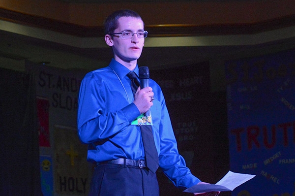 Edward Thiel from St. John the Baptist in West Valley, gives testimony during the third and final day of the 66th annual Diocesan Youth Convention. (Patrick McPartland/Managing Editor)