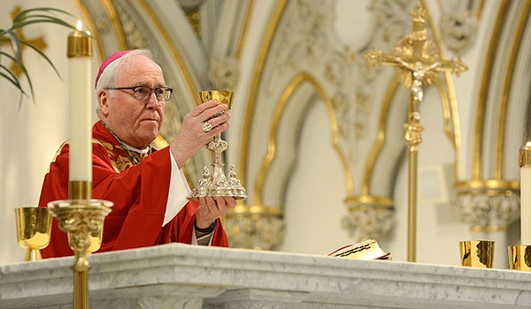 Bishop Richard J. Malone celebrates Palm Sunday Mass at St. Joseph Cathedral. (Patrick McPartland/Managing Editor)